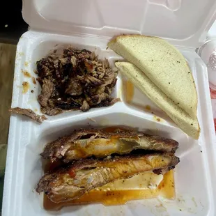 Short ribs &amp; chopped brisket meal. Came with pickles and chopped onions, too.