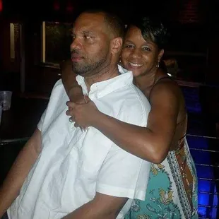 a man and woman hugging