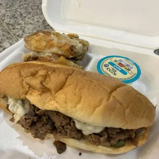 Philly cheesesteak and wings