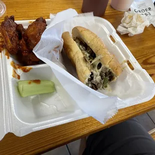 Philly Cheesesteak and habanero wings.