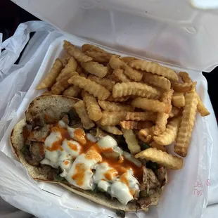 Chicken Philly cheesesteak and fries