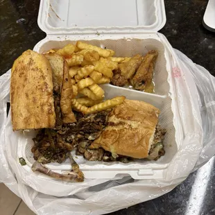 Chicken Philly sub, fries and honey garlic wings.