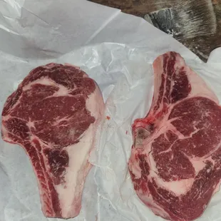 two raw steaks