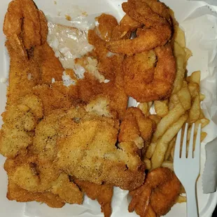 Fish,  shrimp, and fries. (I was so hungry, I started eating before I took a picture. Didn&apos;t ratio to take the picture. My bad. )
