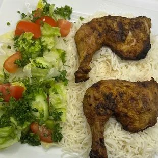 a plate of chicken and rice