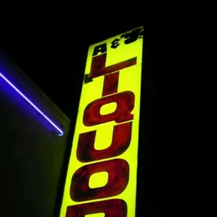 a neon sign in the dark