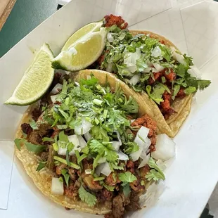 Molcajete street taco and pastor street taco