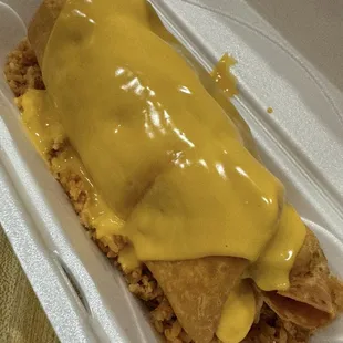 Fried burrito special on a bed of rice.