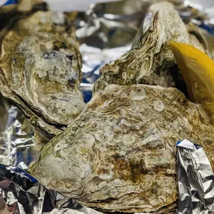 Oysters with dipping sauce. (3 pieces are plenty for one)
