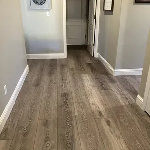 a wood floor in a hallway