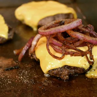 Cheeseburger with grilled onions