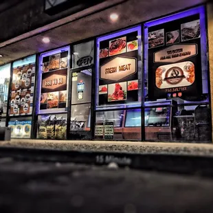 Our new business look . New posters and LED lights added to our windows . Come by and check it out .