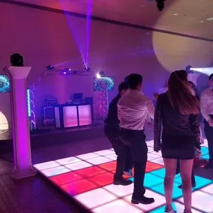 a group of people on a dance floor