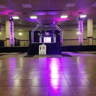 a dance floor with purple lighting