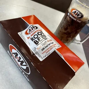 a glass of iced coffee and a box of ice cream