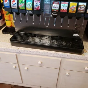 Soda area is a mess with overflow and spills galore  I think if we had seen this we would  have  just left