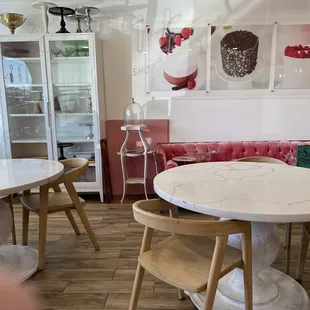 a white marble table and chairs