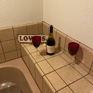Space near the tub for the supplies you need to relax... we brought our wine, the rest was here