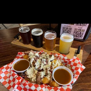 Beer flight and loaded tots (this is a half order!!) with brisket