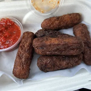 Overcooked mozzarella sticks.  Why would you think this is okay to serve?