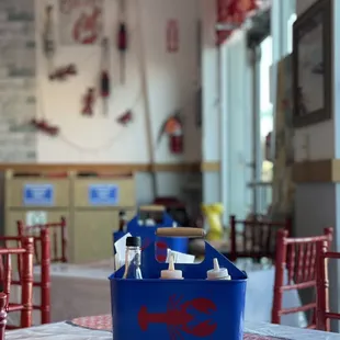 lobsters in a blue box on a table