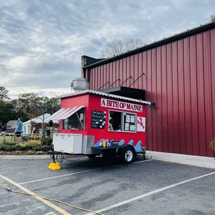 a food truck parked in a parking lot