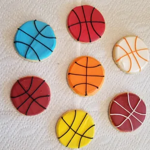 six decorated sports cookies