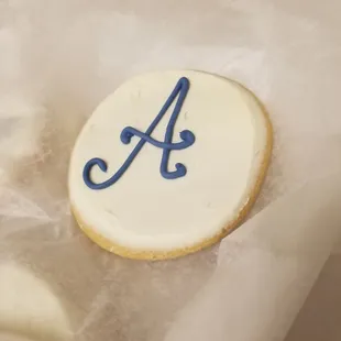 a decorated cookie with the letter a