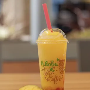 Mango slushie with crystal mango and dragon fruit boba