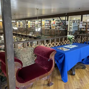 A Book Barn is located in Clovis. This is a photo of part of the second floor and looking down to the first floor.