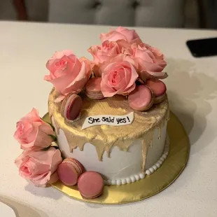 Cake, roses, she said yes, engagement