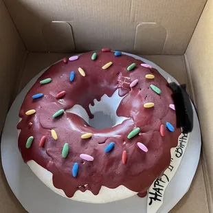 Donut Cake. Vanilla/White Icing/Maroon Icing Drip