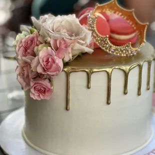 Gold drip, real flowers, pink macaroons, strawberry filling