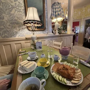 Baked brie, tea sandwiches, pot of tea