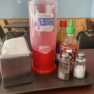 Napkins, chopsticks  and condiments at the table