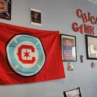 a chicago flag hanging on a wall