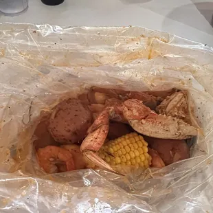 1/2 lb. Dungeness Crab 1/2 lb. Shrimp No Head This picture doesn&apos;t do it justice there was a massive amount of food here.