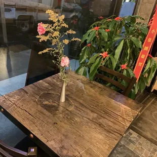 a vase of flowers on a table