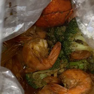 seafood boil bag house sauce, extra hot, lobster tail and shrimp