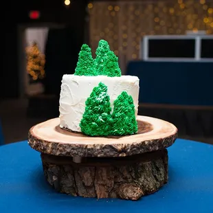 a cupcake on a tree stump