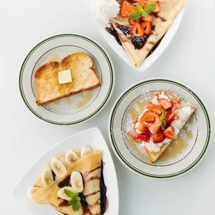 three plates of food on a table