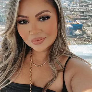 Carmela L.