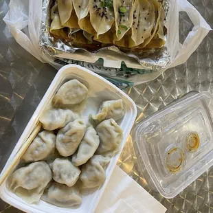 Steamed pork and celery dumplings, pork and celery potstickers. Both excellent!!!