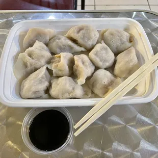 Beef and cabbage dumplings with black vinegar for dipping