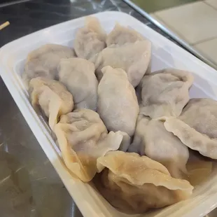 Pork and sour cabbage boiled dumplings