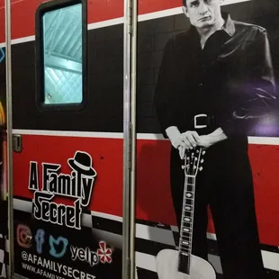 a man holding a guitar