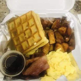 a waffle sandwich with bacon, eggs, and hash browns