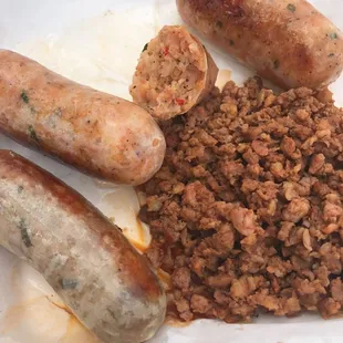 The wiener plate of duck, shrimp and chorizo sausages