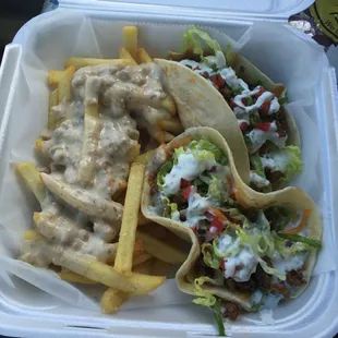 The chorizo tacos with sausage gravy fries or southern poutine