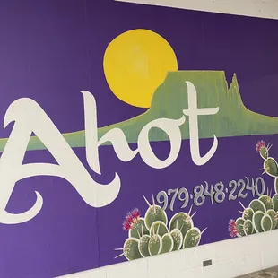 a mural of a desert scene